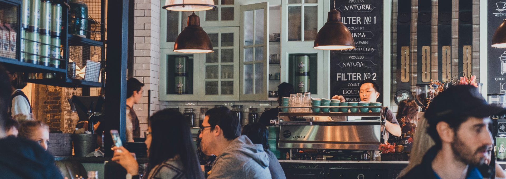 group of people eating on restaurant