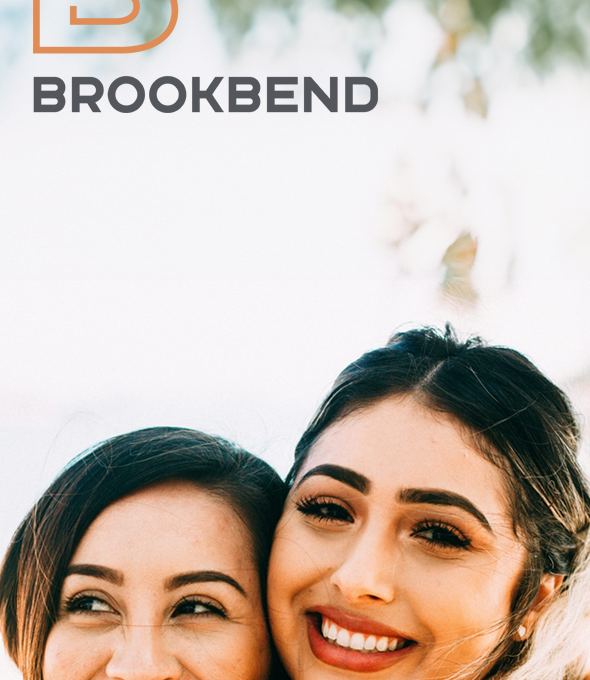 two women hugging each other with the words brookend on the side at The Brookbend